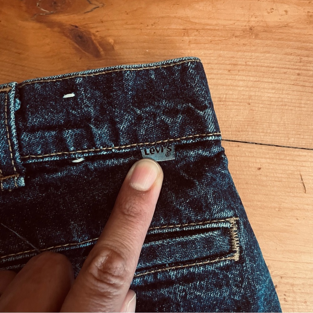 Vintage Levi’s Blue tab pleated, high-waisted jeans